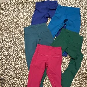 Wundertrain Lululemon Leggings size 6
Set or 5- 2 Blue, 2 Green, 1 Pink